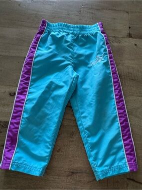 Puma retro Kids Aqua Blue Track Pants with Purple Side Stripes size 2